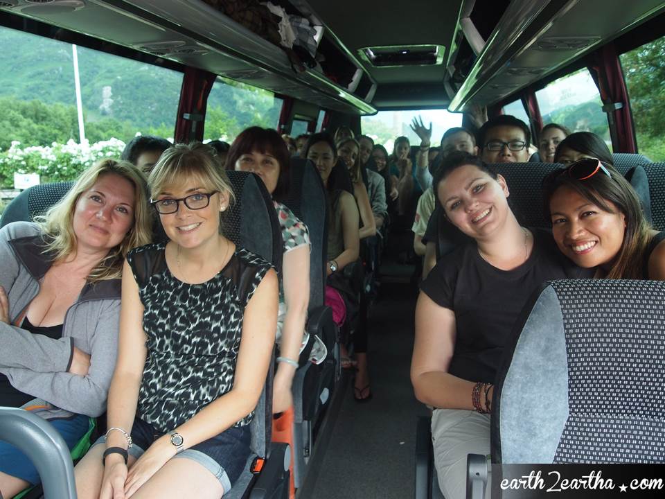 The tour group in MacBackpackers' Bus